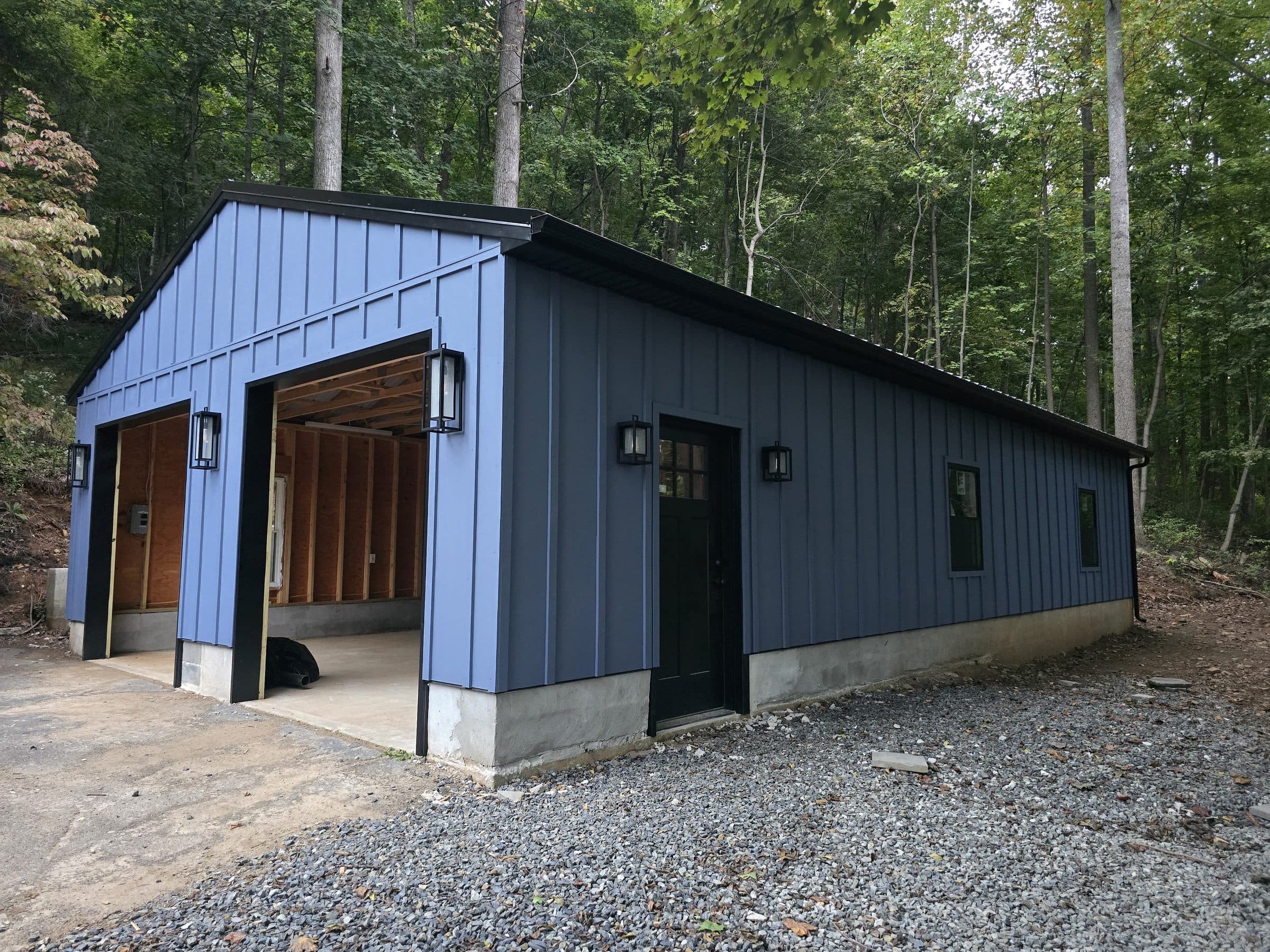 Garage builder and remodeler: new two-bay detached garage with blue board-and-batten siding in Perkiomenville, PA