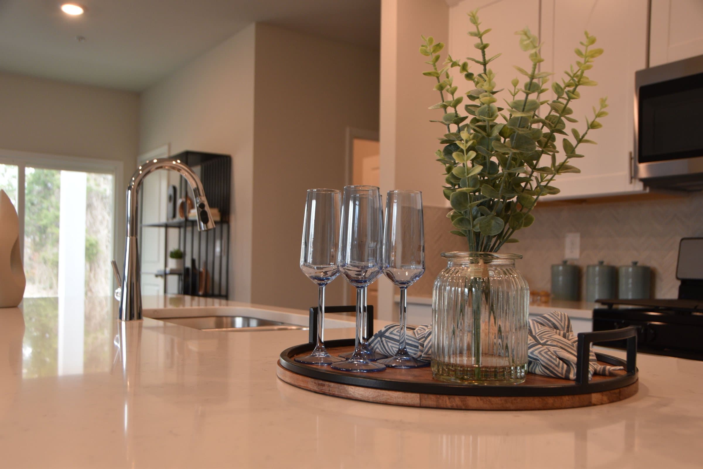 Remodeler in Bucks and Montgomery County, PA: bright remodeled kitchen with a quartz countertop island